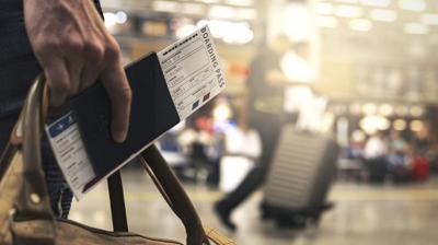 Physical Presence Test requirements illustrated by traveler with boarding pass and luggage